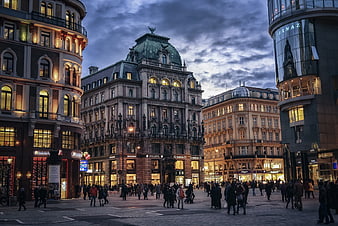 Evening Cityscape of Vienna with Historic Architecture and Pedestrians
