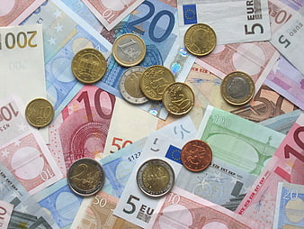 Scattered Euro Banknotes and Coins Flat Lay Background