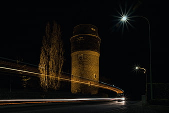 Long Exposure Night Photography of Historic Water Tower with Light Trails