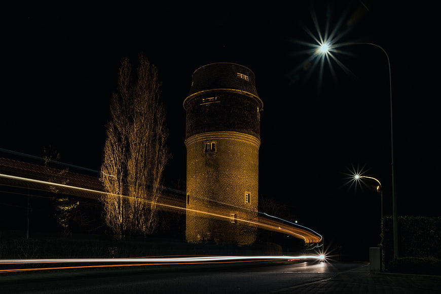 Long Exposure Night Photography of Historic Water Tower with Light Trails