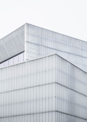 Minimalist modern white building facade with geometric lines