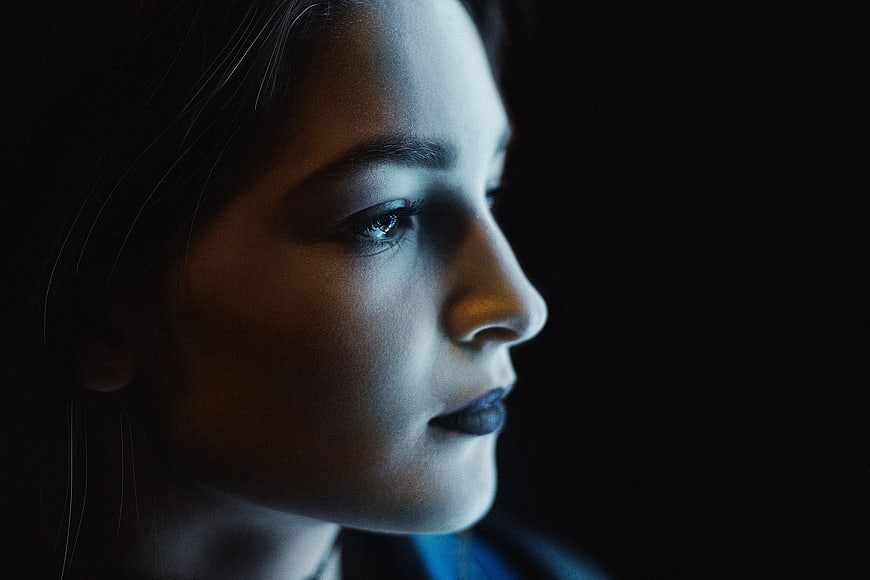 Cinematic Night Portrait of Woman in Profile