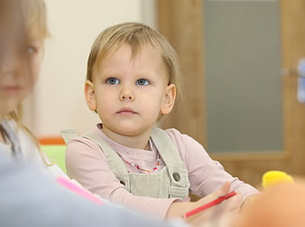 Cute Toddler Girl in Kindergarten Class