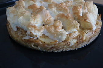 Homemade Apple Meringue Tart on Black Plate