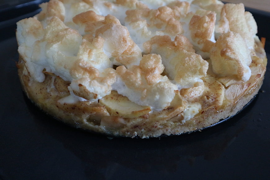 Homemade Apple Meringue Tart on Black Plate