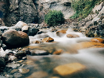 Long Exposure Mountain Stream Flowing Over Rocks