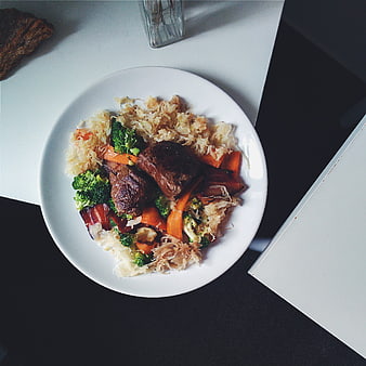 Top view of beef steak with broccoli and sauerkraut