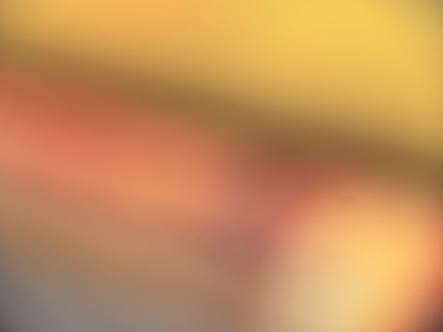Abstract Blurred Gradient Background in Warm Orange and Yellow Tones