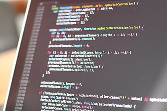 Close-up of computer programming code on a monitor screen