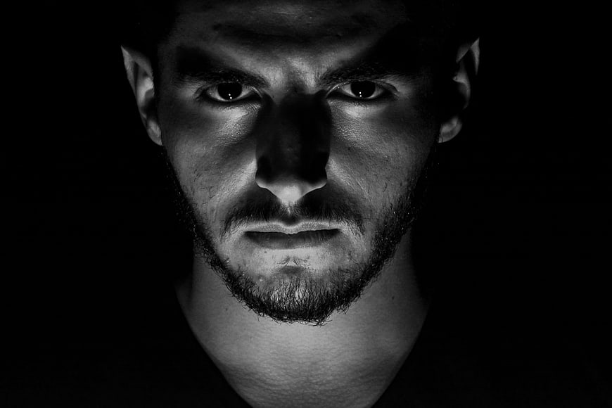 Dramatic Black and White Portrait of Man with Intense Gaze