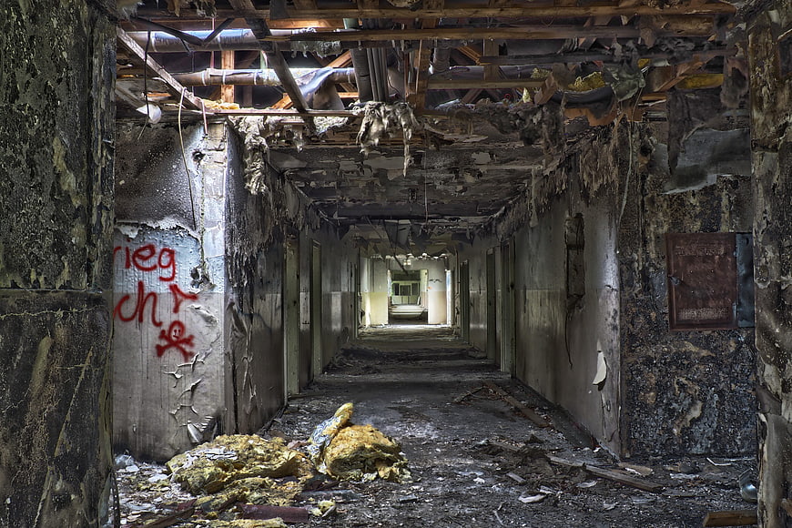 Abandoned Corridor With Fire Damage And Decay