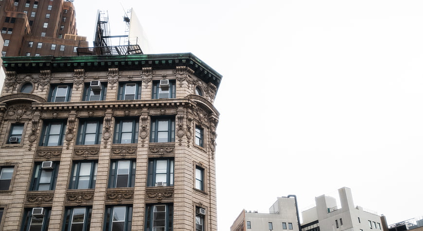 Low angle view of ornate historic city building facade