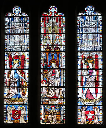 Gothic stained glass window depicting female saints and religious figures