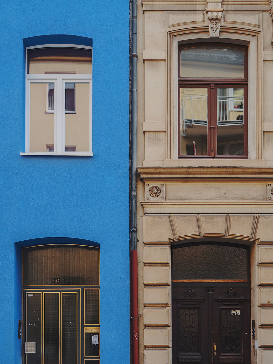Colorful Blue and Beige Building Facades with Doors
