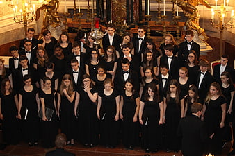 Formal Youth Choir Singing In Historic Chapel Interior