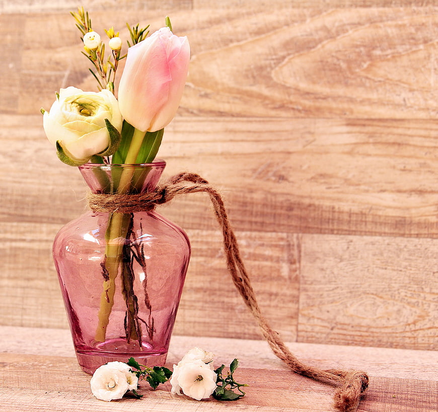 Pink Tulip and White Ranunculus in Glass Vase on Wood