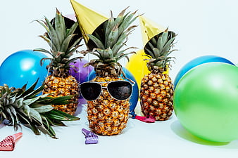 Party Pineapples with Sunglasses and Balloons
