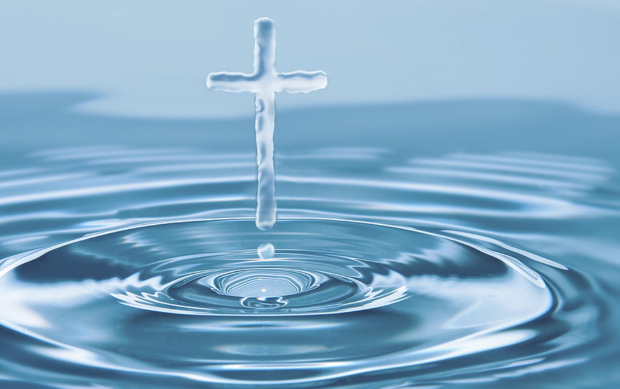 Water Cross Splash on Blue Water Surface