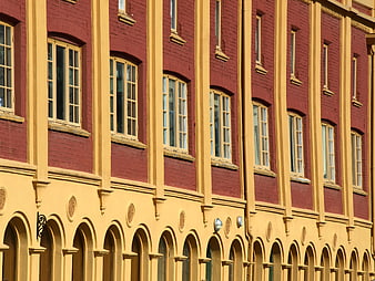 Red brick and yellow facade of historic Victorian architecture
