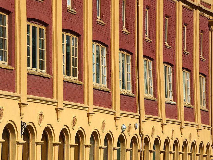 Red brick and yellow facade of historic Victorian architecture