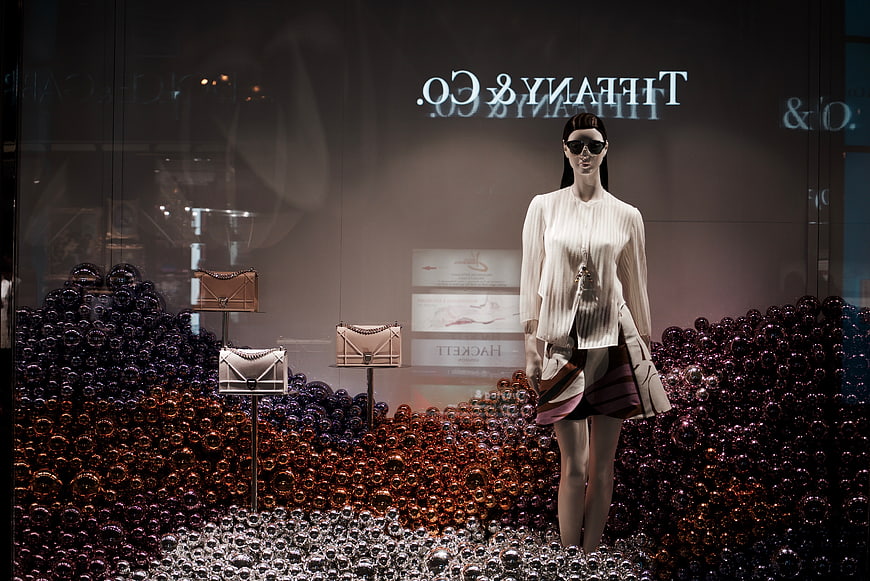 Tiffany & Co. luxury window display with mannequin and handbags