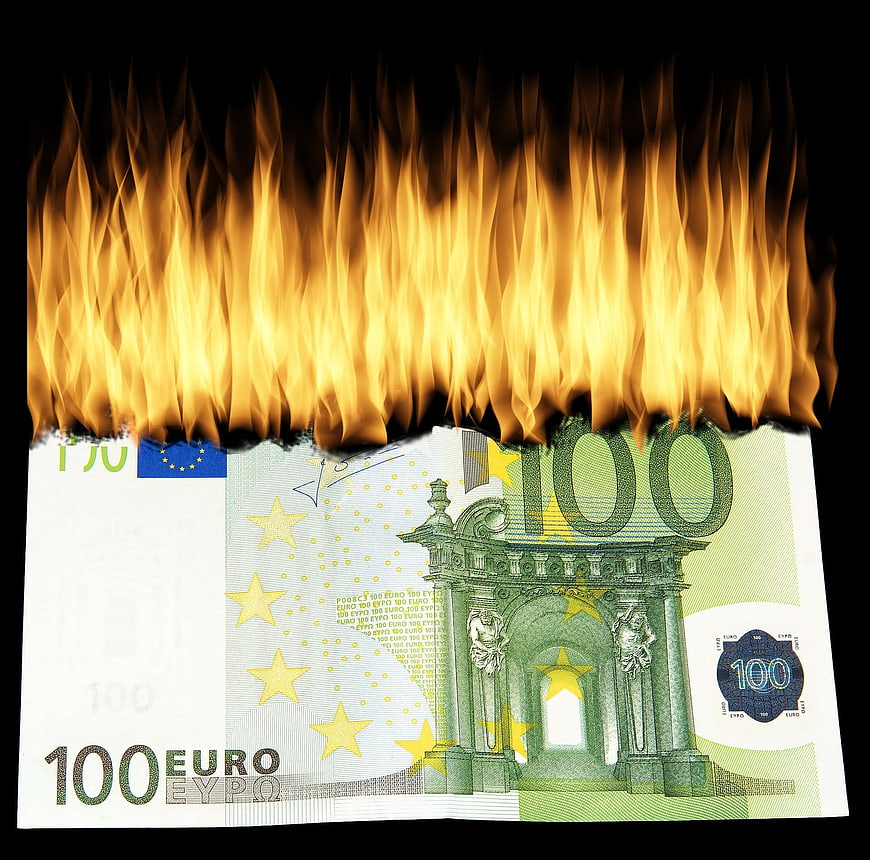 100 Euro Banknote Burning With Flames On Black Background