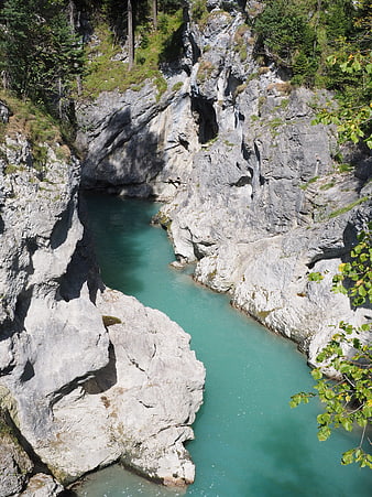 Turquoise River Flowing Through Rocky Canyon in Bavaria