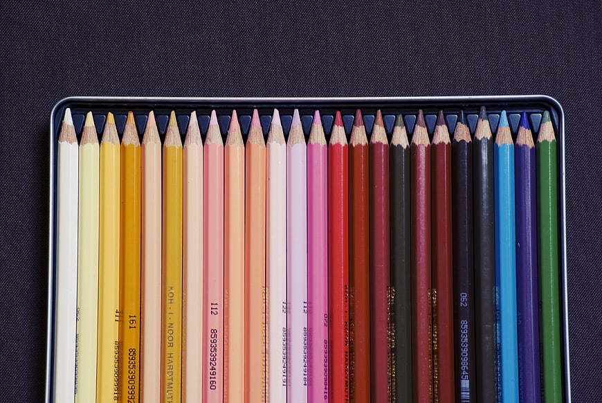Top View of Colorful Pencils in Metal Tin Case