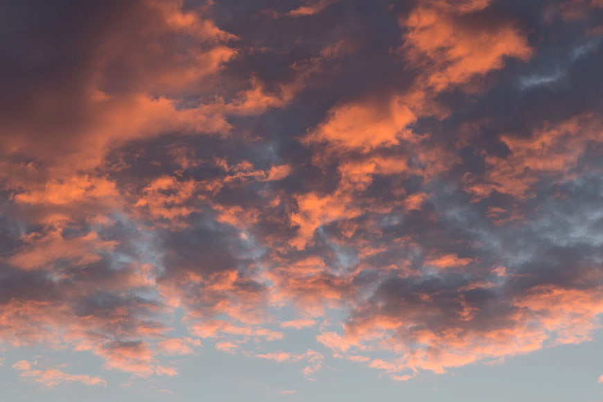Dramatic Orange and Blue Sunset Clouds Sky