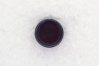 Top View of Black Coffee in Cup on White Marble