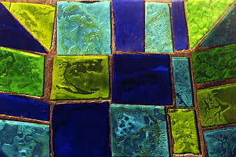 Colorful textured glass mosaic tiles in blue and green