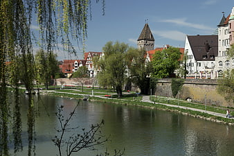Scenic View of Ulm Danube Riverbank with Historic Tower