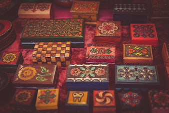 Collection of Hand-Painted Decorative Wooden Boxes with Intricate Floral Patterns