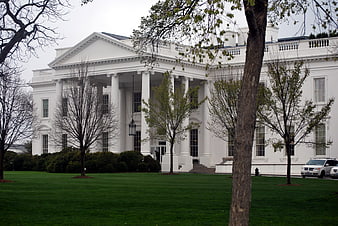 White House South Portico View With Green Lawn And Trees