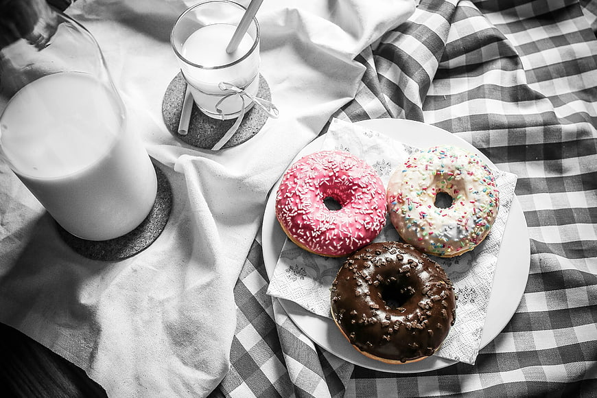 Color Splash Donuts and Milk on Checkered Tablecloth
