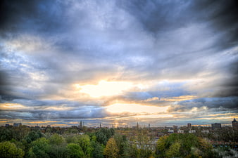 Dramatic HDR Sky Over Groningen Cityscape with Trees
