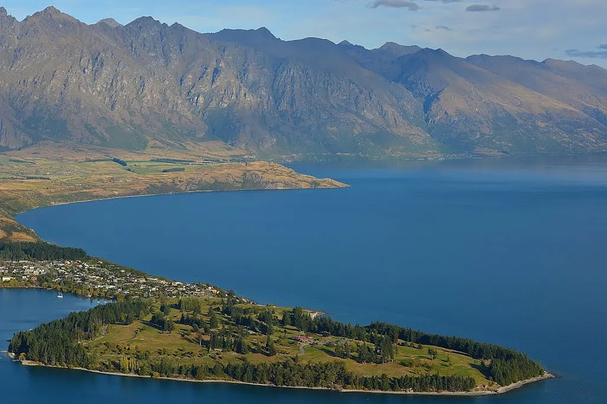 Aerial View of Green Island in Lake Wakatipu with Mountains