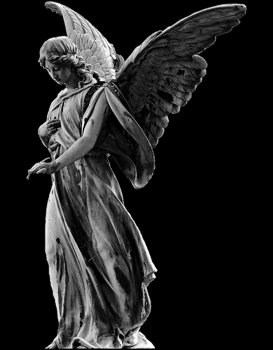 Black and white statue of a grieving angel with wings