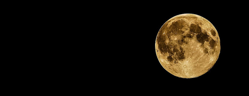 Full Moon in Night Sky with Golden Craters