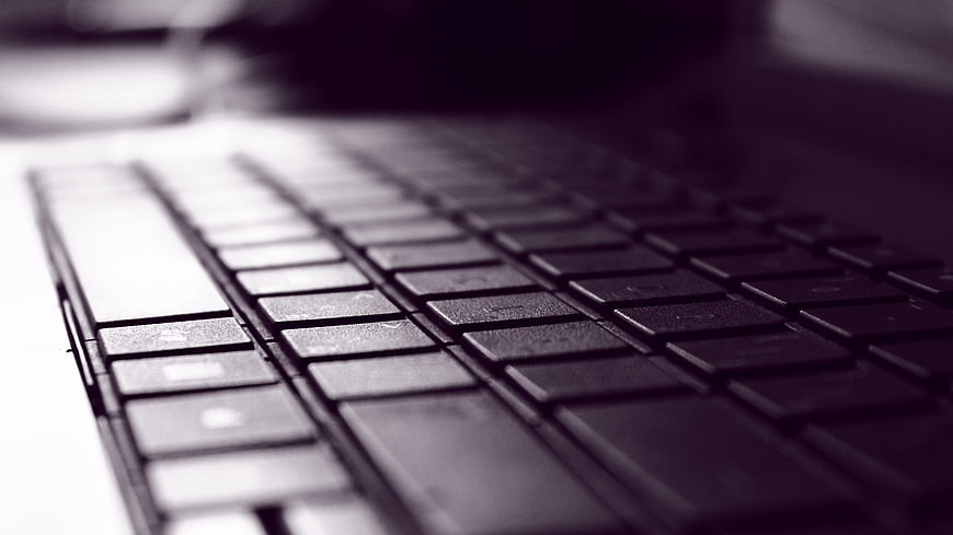 Close-up of laptop keyboard with shallow depth of field