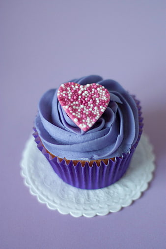 Purple Cupcake with Pink Heart Sprinkles on White Doily