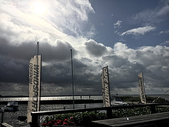 Dramatic Stormy Sky Over Baltic Sea Marina with Sailboats