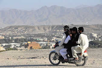 Four Young Men Riding a Motorcycle in Kabul, Afghanistan
