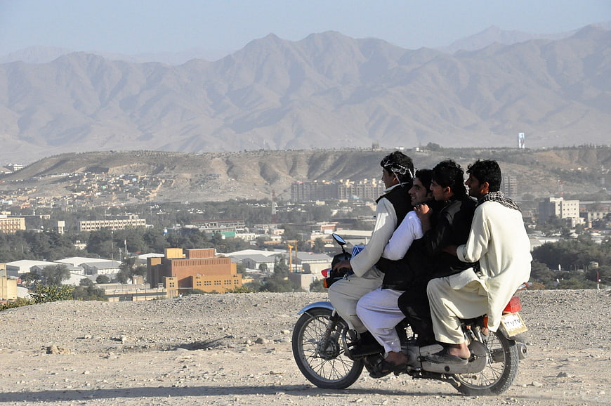 Four Young Men Riding a Motorcycle in Kabul, Afghanistan