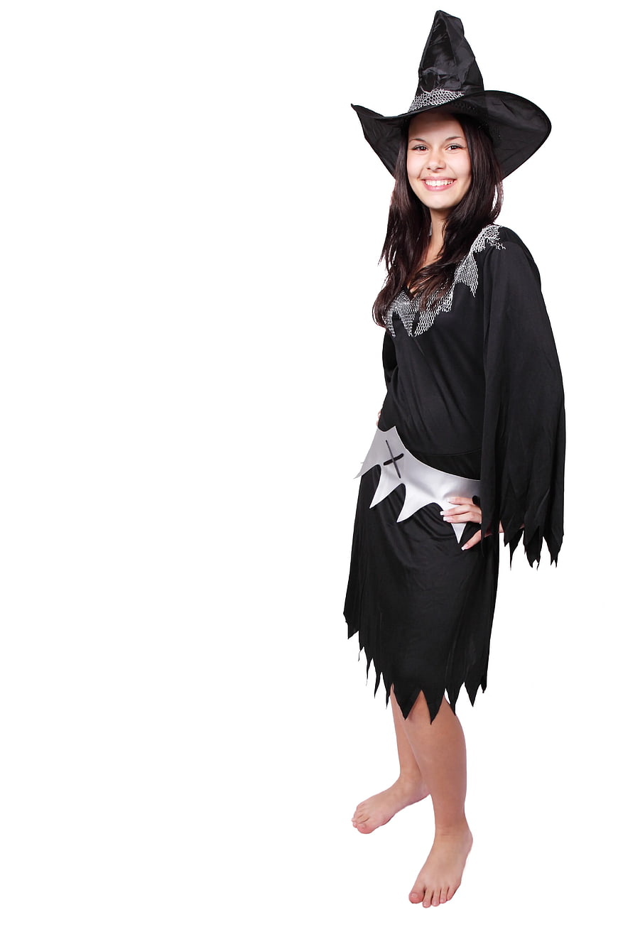 Smiling Woman in Black Witch Costume on White Background