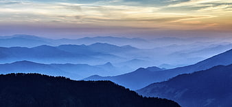 Misty Blue Mountain Layers at Sunrise