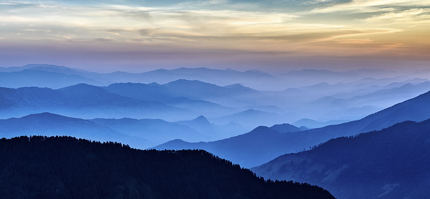 Misty Blue Mountain Layers at Sunrise