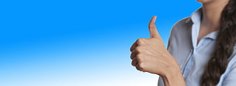 Woman Giving Thumbs Up Against Blue Gradient Background