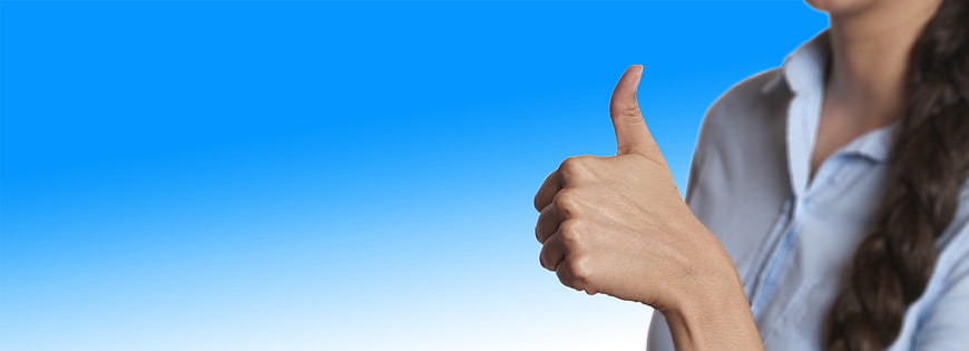 Woman Giving Thumbs Up Against Blue Gradient Background