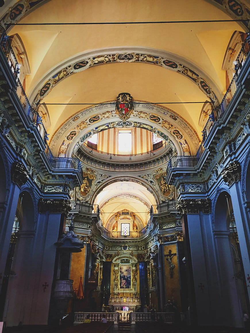 Grand Baroque Cathedral Interior with Ornate Arches and Altar